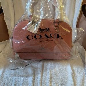 Pink Coach bag brand new with tags and original packaging never worn